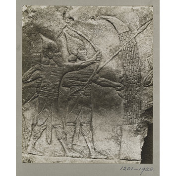 photograph - Assyrian slab of archers and spearmen, from the Palace of Shur-Bari-Pal (BC. 668-626), at Nineveh. ca. 660 B.C. photograph - Assyrian slab of archers and spearmen, from the Palace of Shur-Bari-Pal (BC. 668-626), at Nineveh. ca. 660 B.C.