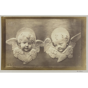 photograph - Two enamelled heads of seraphines photograph - Two enamelled heads of seraphines